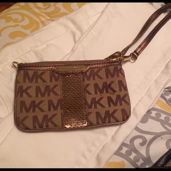 Michael Kors gold wristlet!