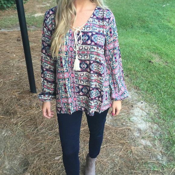 Printed wine colored top.