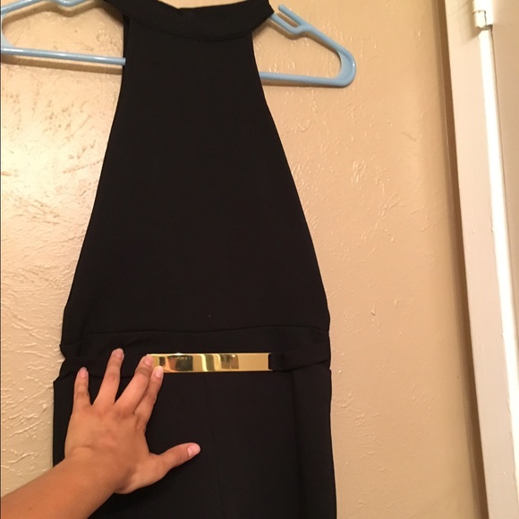 Black jumper shorts with gold belt