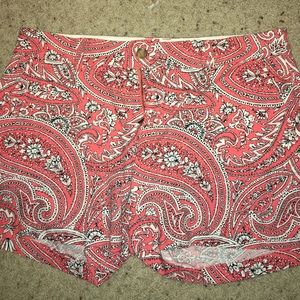 Orange black and white paisley shorts. 5 in