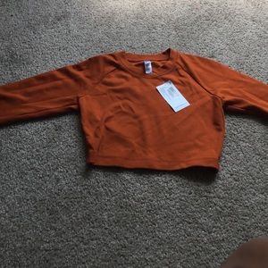Orange long sleeve crop top