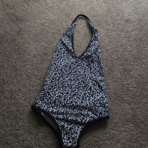 Black and white body suit