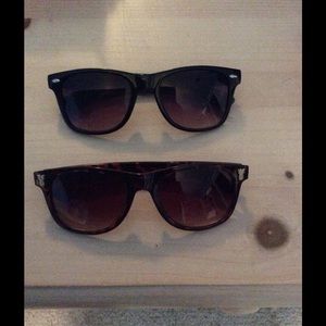 Two pair of no name sunglasses