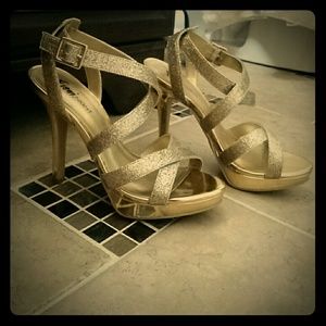 Golden high heels