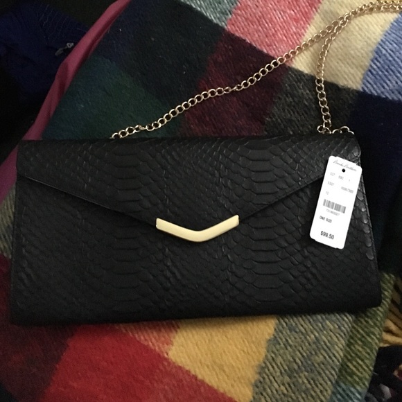 Black clutch purse (brand new)