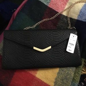 Black clutch purse (brand new)