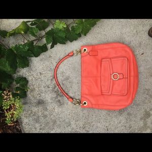 Bright coral coach purse