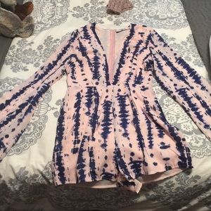Pink and blue tie-dye romper with deep V neckline