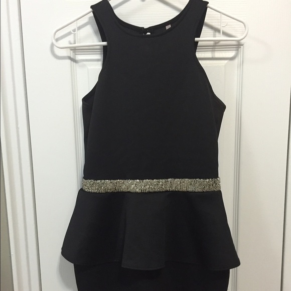 Francesca’s peplum dress with open back