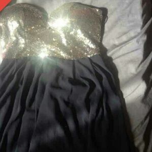 Black and gold strapless windor dress
