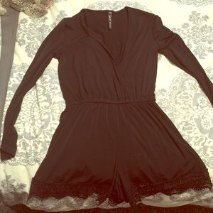 Black romper with lace detail