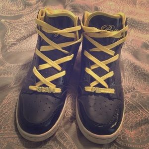 Black and yellow high tops