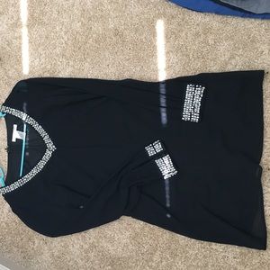 Mini dress with sleeves and beaded cuffs