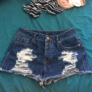 Distressed denim shorts