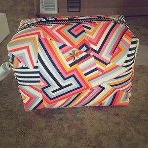Tory burch make up colorful bag. Never been opened