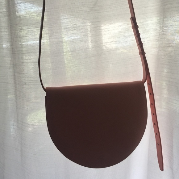 Crescent shaped pastel pink purse