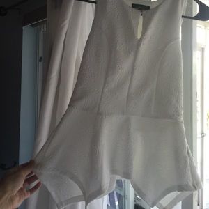 white dressy blouse with embellished paisley