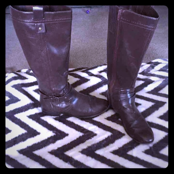 Tall brown riding boots