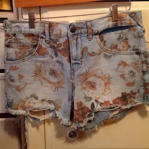 Free People ripped floral Jean shorts