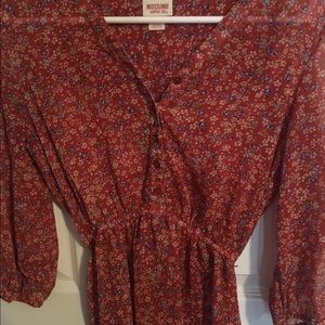 lightly worn see through blouse