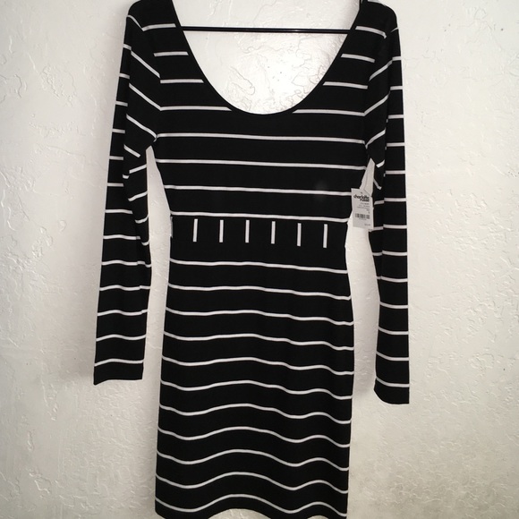 ✨ Black and white stripped fitted mini dress