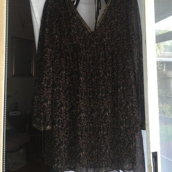 Flowy with beads on the plunging v neck