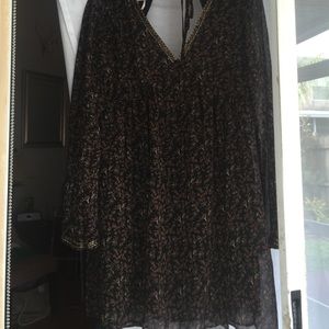 Flowy with beads on the plunging v neck