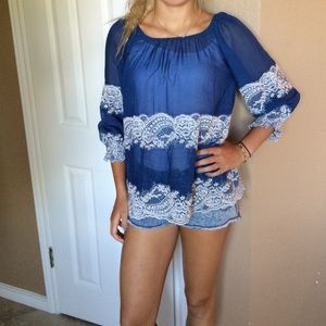 Navy with cream lace.