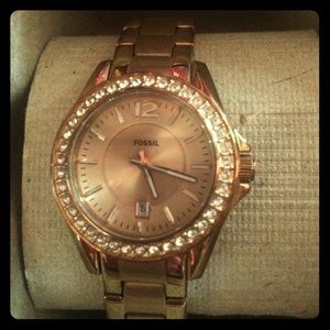 Gold fossil watch