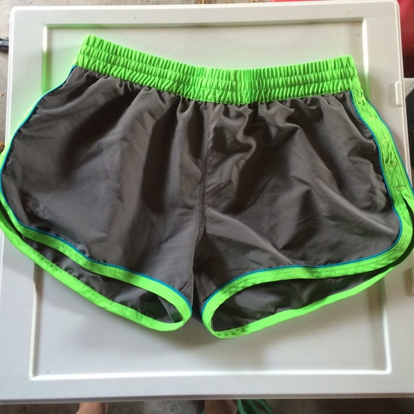 Grey Under Armour running shorts- size medium