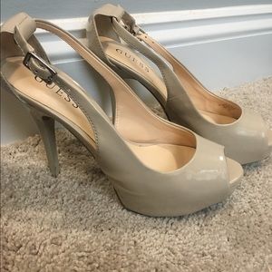 Size 7 guess open toe heels.