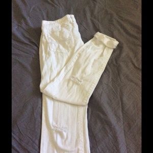 White distressed boyfriend jeans.