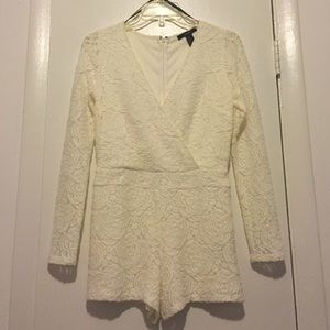 A white lace romper. It's NEW!!! Never been worn!