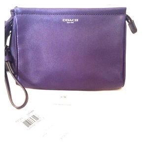 Legacy medium sized wristlet in marine.
