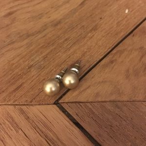Gold stud earrings