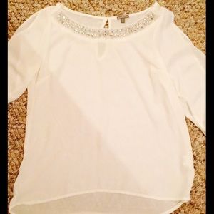 3/4 length white blouse