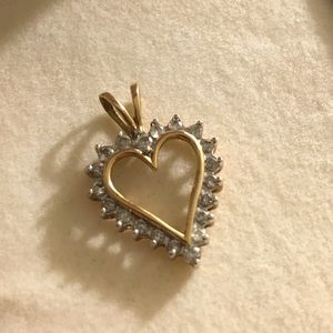 Solid gold and diamond heart pendant