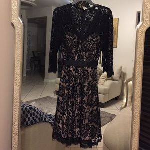 Amazing black lace dress. Size 12 New with tag.