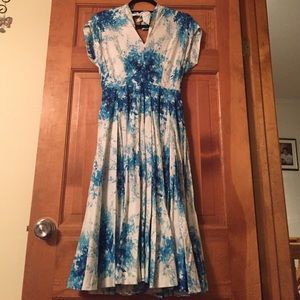 Brand new Anthro dress with a cute tie around neck
