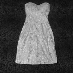 White dress with silver lace overlay