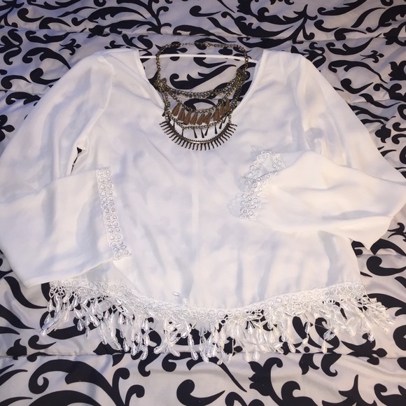 White boho cutout long sleeve with fringe