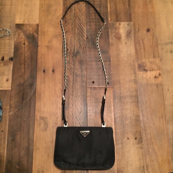 Prada Handbags - Prada black and silver cross body.
