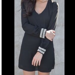 Black dress with pearl detail