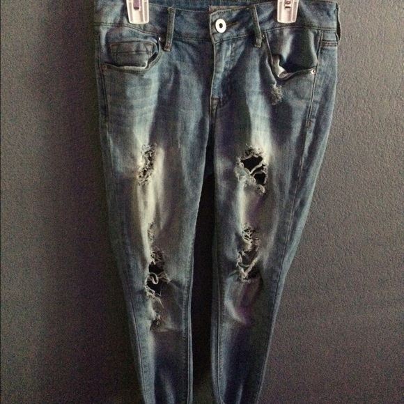 buckle ripped jeans