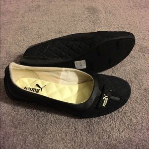 Puma black flats