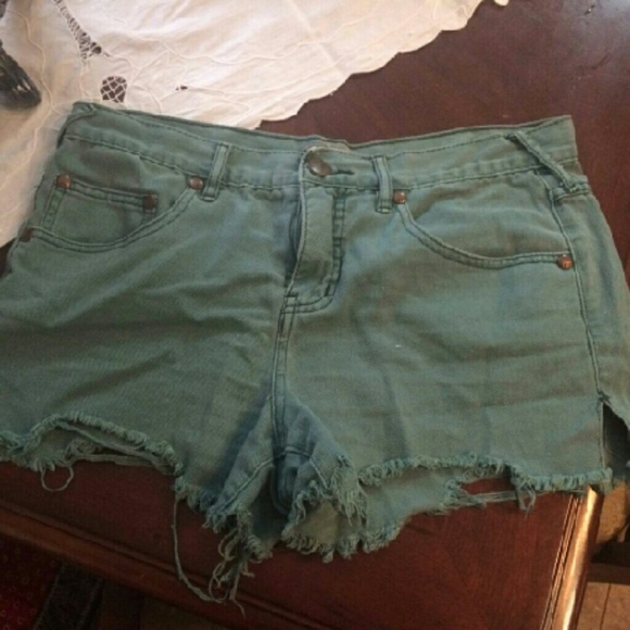 Free People teared up blue shorts