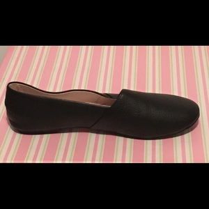 Black leather flats