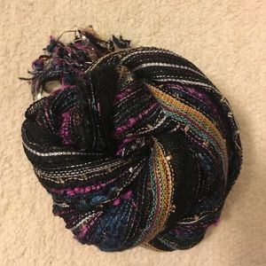 Multi color loose weave scarf with twisted fringe