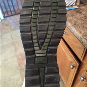 Genuine black leather Ugg with Sherpa lining.