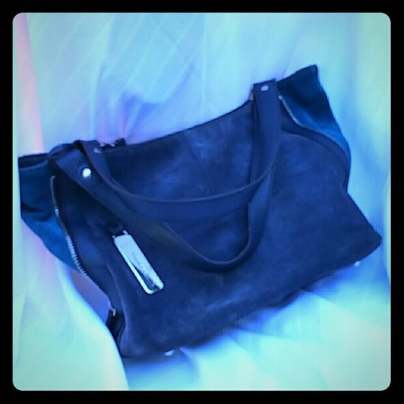 Tignanello suede person